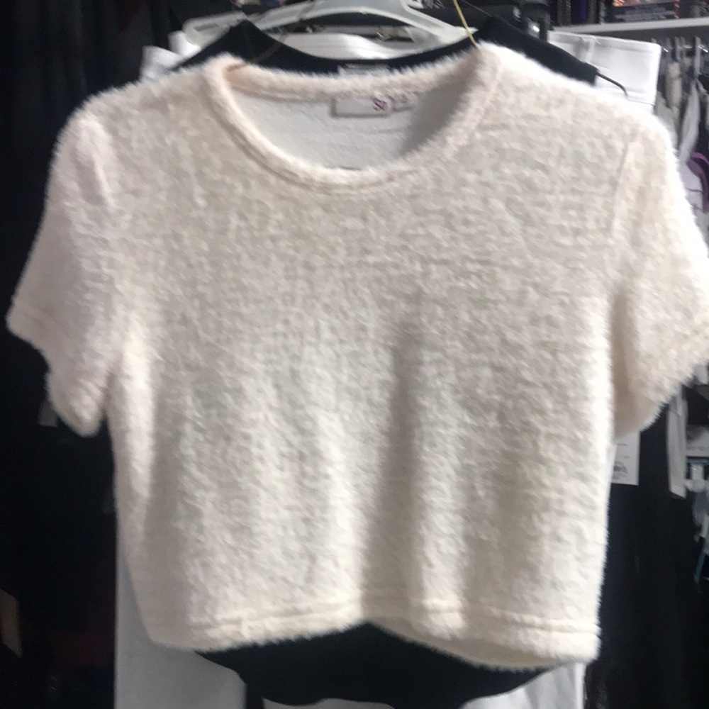 Junior’s Angora type material, soft like fuzzy look. Short sleeve